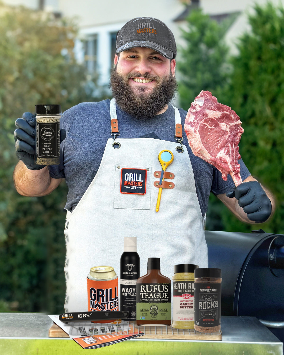 Upper Crust Steak Kit dry brine and reverse sear gift set at an outdoor grill with GMC pitmaster